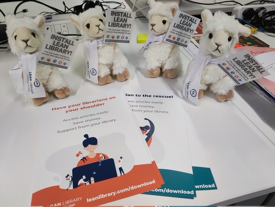 Four stuffed llamas at University of Lancaster Library with tags on their ears which say "Install Lean Library"
